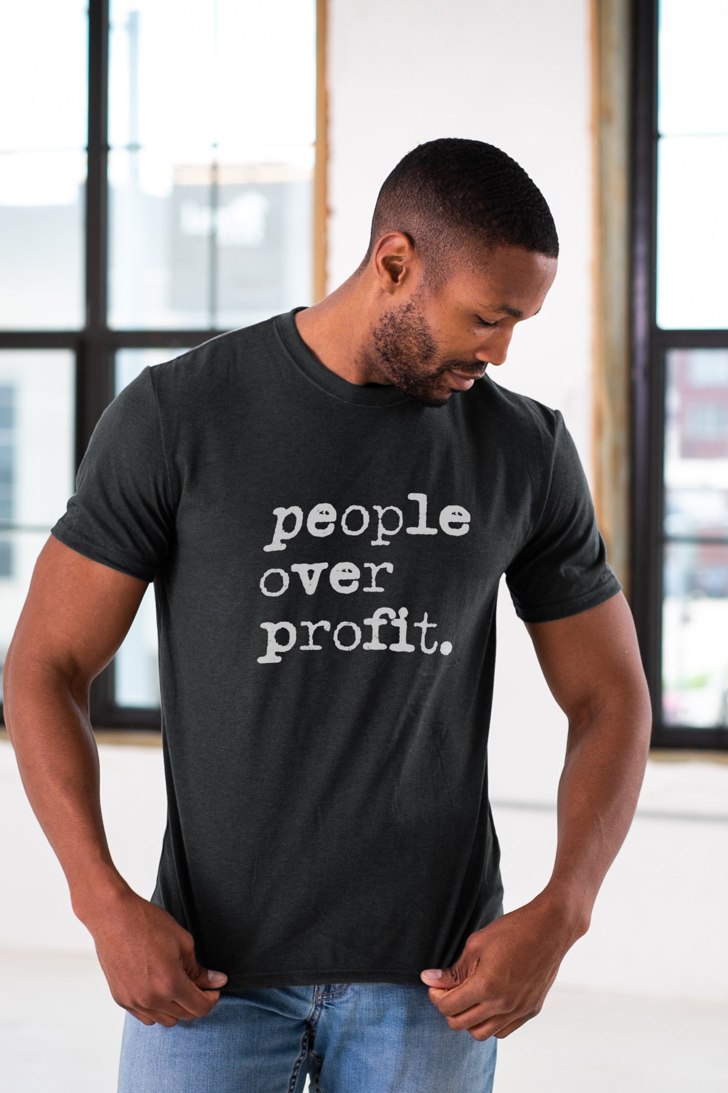 People over Profit Unisex Eco-Triblend Tee