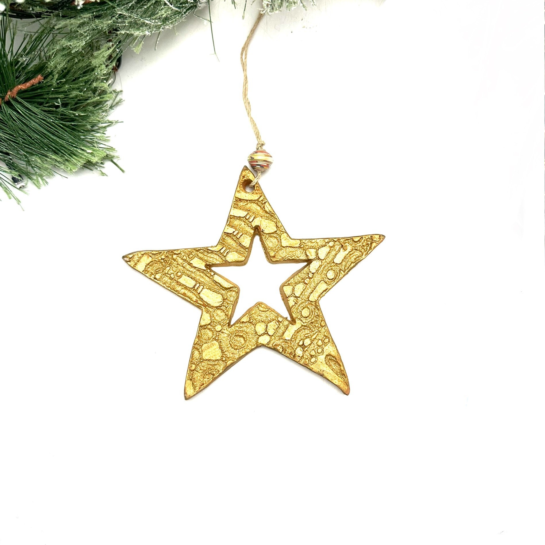 old ceramic star ornament handmade Haiti fair trade — holiday Christmas gift 